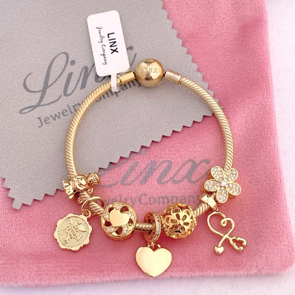 Linx Yellow Gold Snake Chain Bracelet with Registered Nurse Themed Charms - Picture 7 of 14